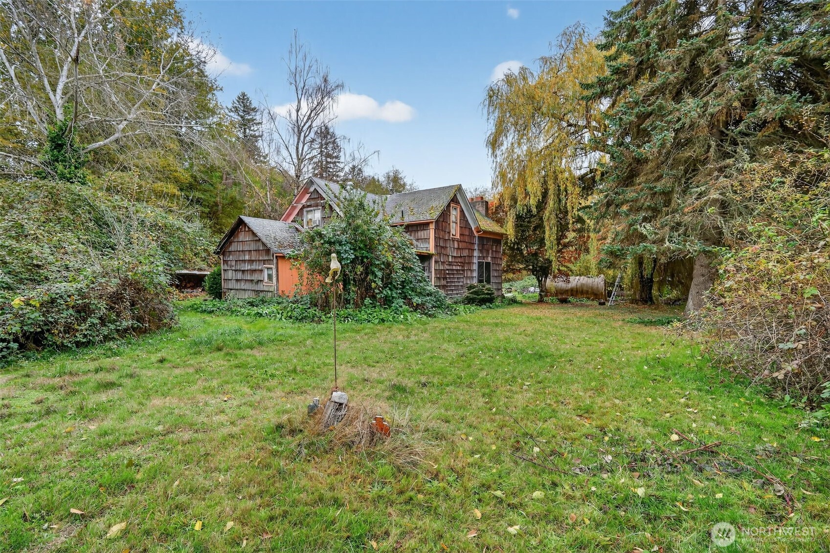 11941 Schold Road Northwest Silverdale, WA 98383 - Photo 24 of 35 a front view of a house with garden