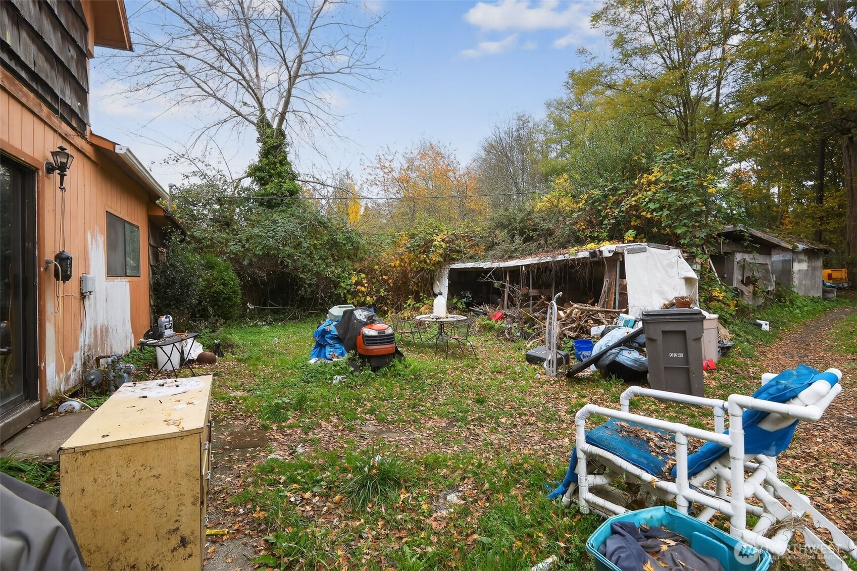 11941 Schold Road Northwest Silverdale, WA 98383 - Photo 30 of 35 a view of backyard with sitting area and slide
