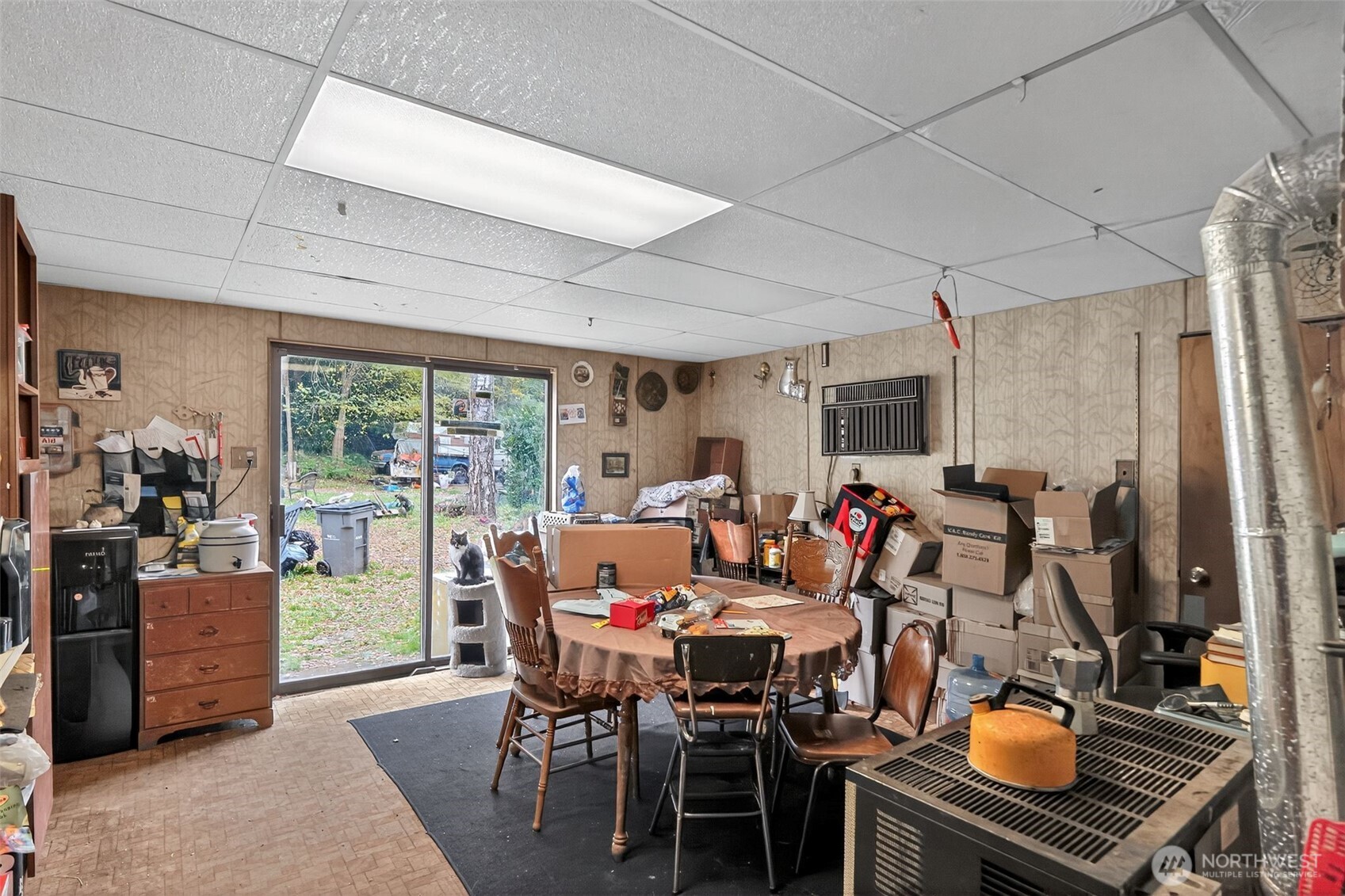 11941 Schold Road Northwest Silverdale, WA 98383 - Photo 6 of 35 a view of a dining room with furniture window and outside view