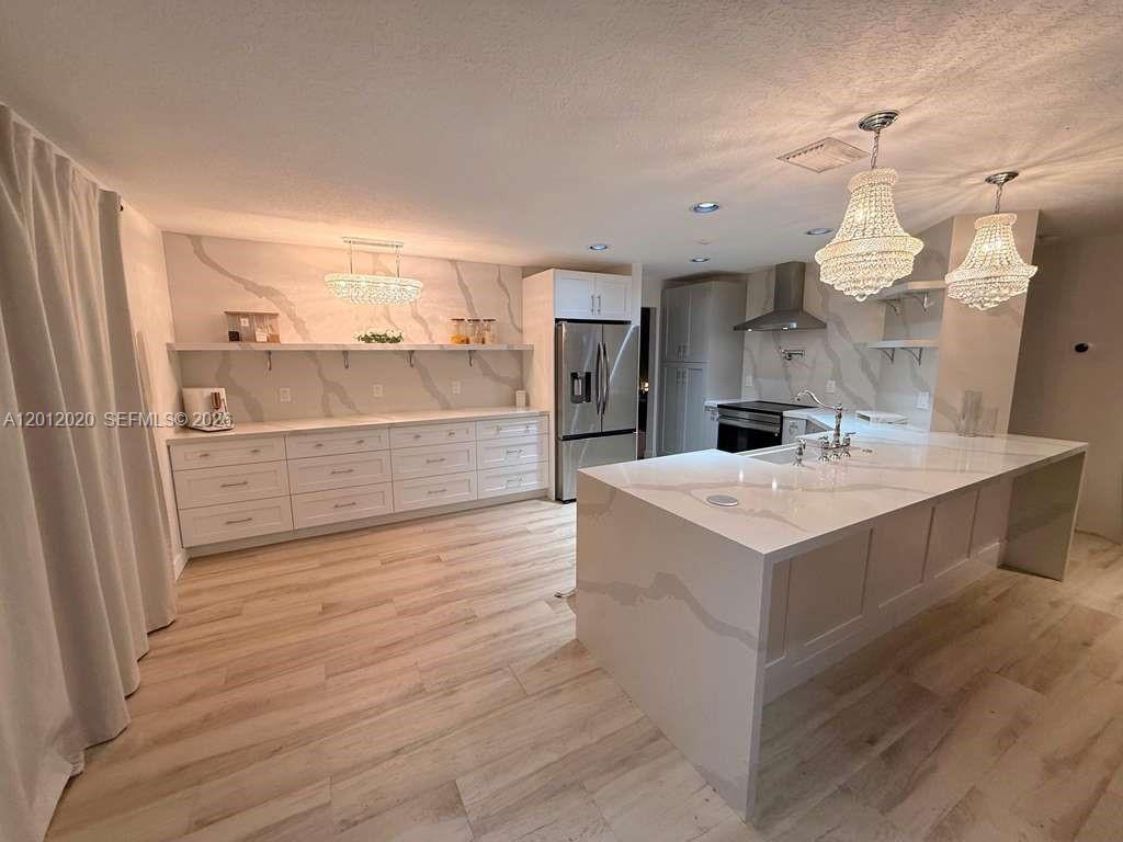 303 Bridgeton Road Weston, FL 33326 - Photo 3 of 52