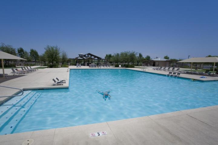 3815 East Chickadee Road Gilbert, AZ 85297 - Photo 7 of 9 an aerial view of a house with a yard and lake view