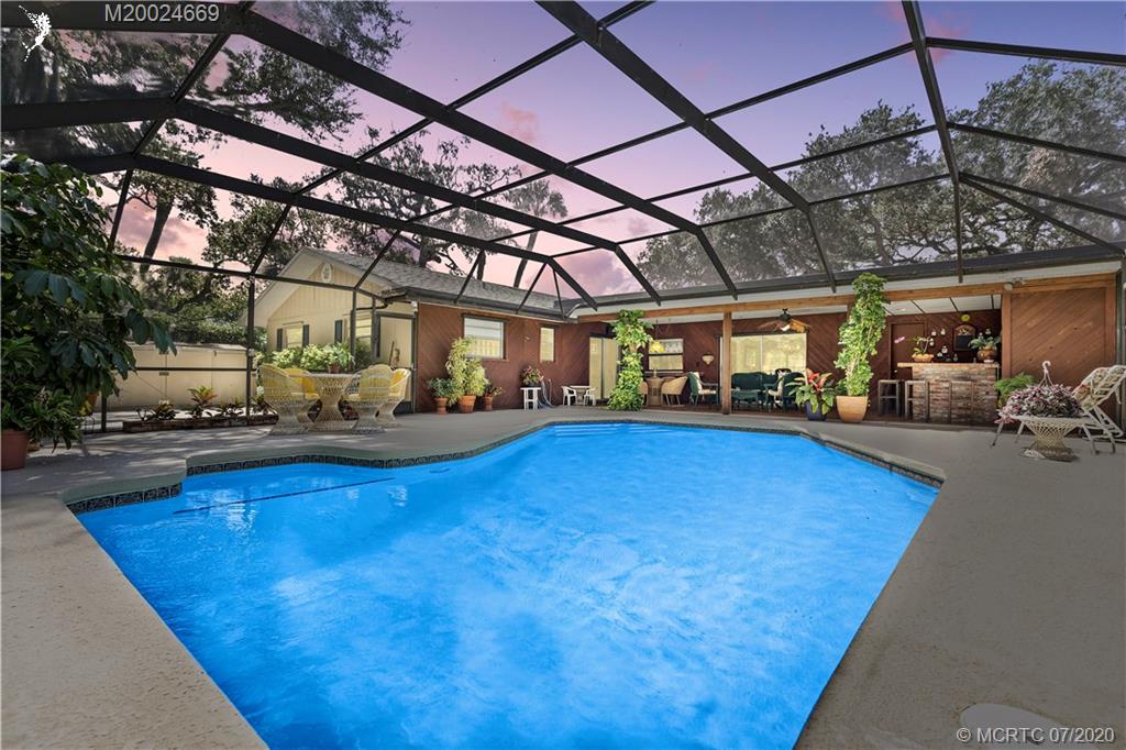 15 Banyan Road Stuart, FL 34996 - Photo 38 of 52 Twilight is great time to enjoy the pool too.