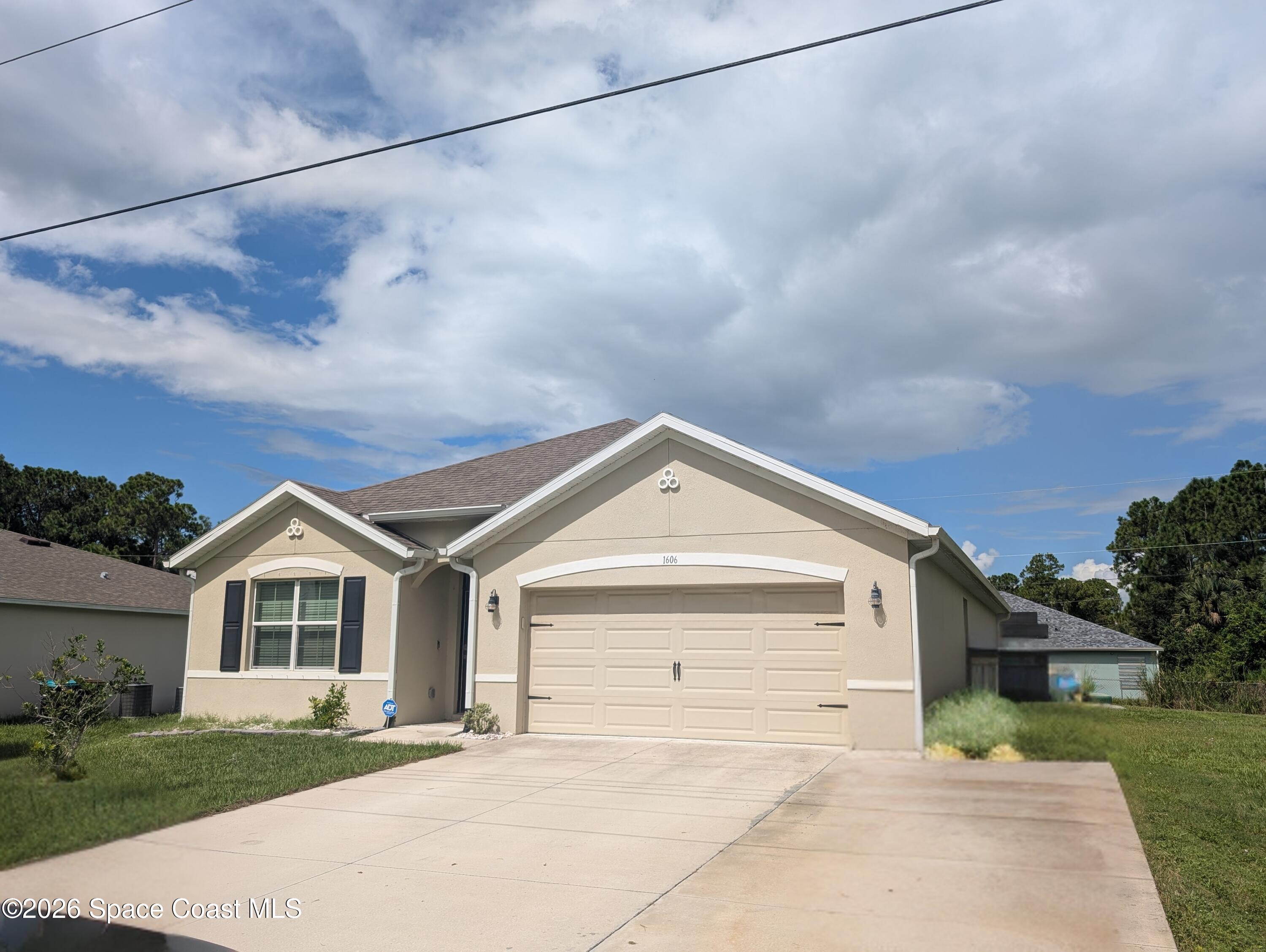 1606 Degroodt Road Southwest Palm Bay, FL 32908 - Photo 1 of 18 front