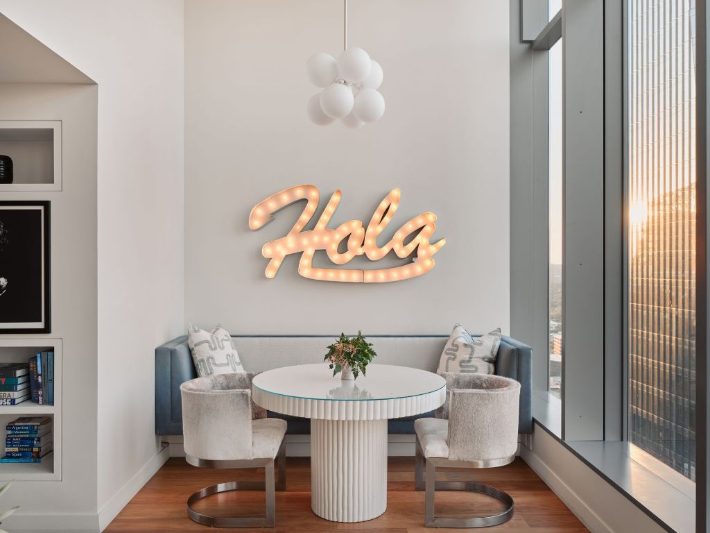 210 Lavaca Street, Unit 3504 Austin, TX 78701 - Photo 20 of 40 a dining room with furniture and wooden floor