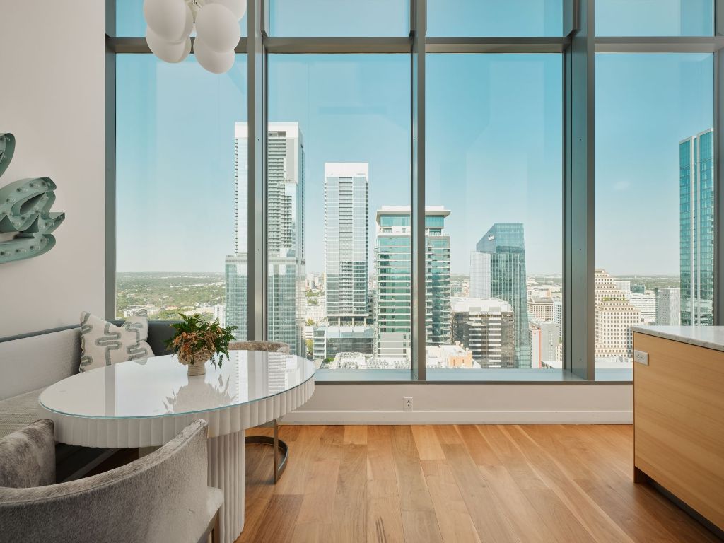 210 Lavaca Street, Unit 3504 Austin, TX 78701 - Photo 21 of 40 a view of a living room and a floor to ceiling window