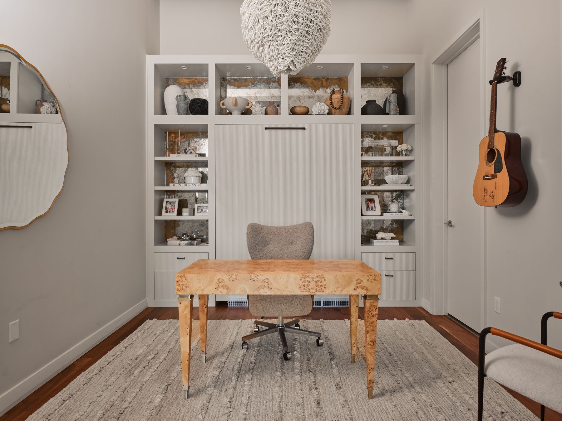 210 Lavaca Street, Unit 3504 Austin, TX 78701 - Photo 23 of 40 Home office featuring built in features, a chandelier, and wood finished floors