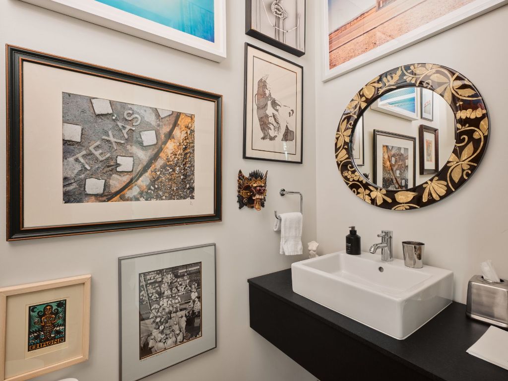 210 Lavaca Street, Unit 3504 Austin, TX 78701 - Photo 34 of 40 a white building with a white walls and a mirror