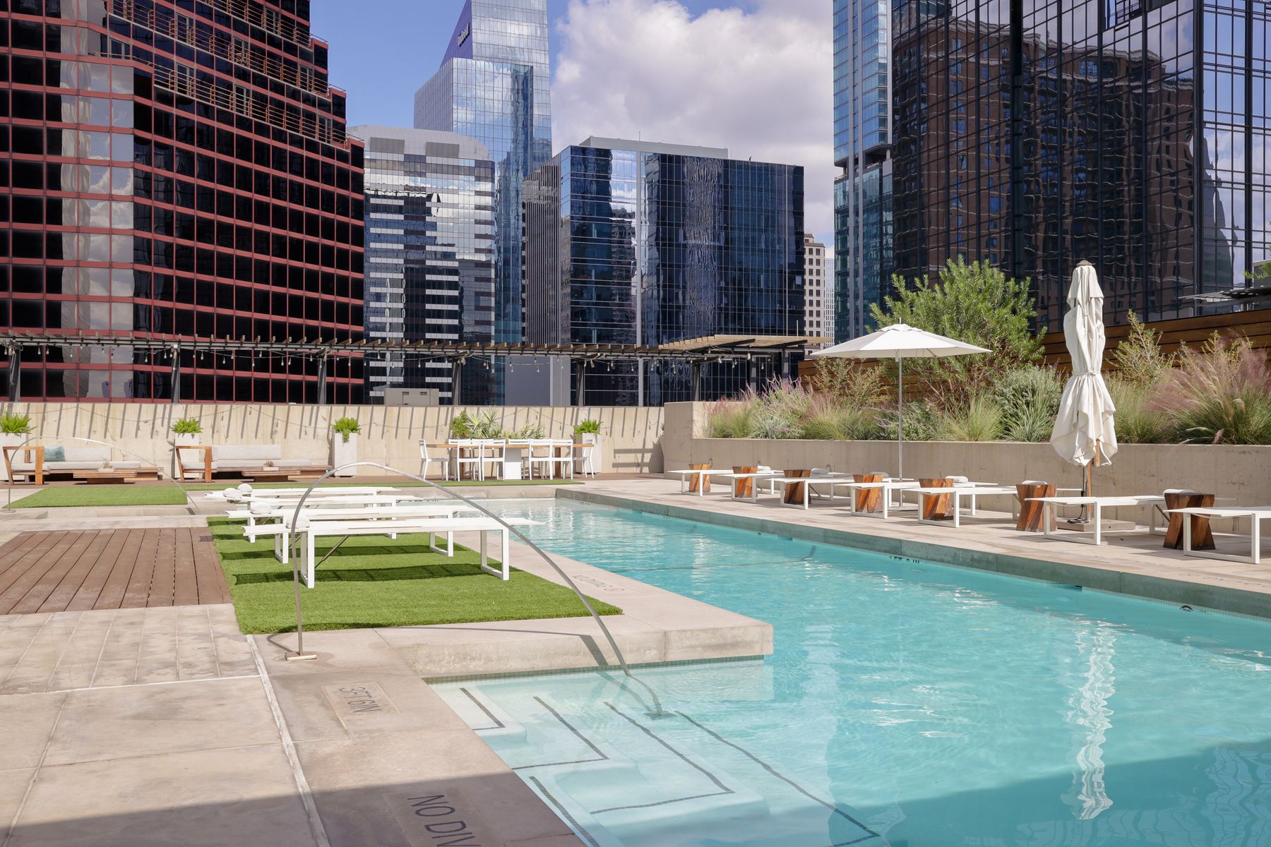 210 Lavaca Street, Unit 3504 Austin, TX 78701 - Photo 37 of 40 Community pool featuring a view of city and a patio area