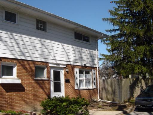 811 Hibbard Road, Unit B Wilmette, IL 60091 - Photo 1 of 1 a view of a house with a tree