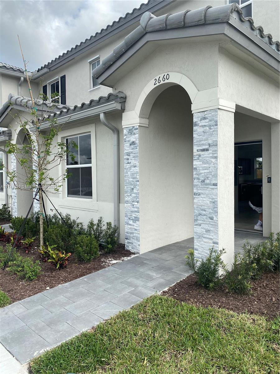 Homestead Homestead, FL 33035 - Photo 2 of 11 a front view of a house with garden