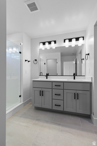 2816 West Aurora Avenue Mapleton, UT 84664 - Photo 9 of 20 Full bath with a shower stall, double vanity, and light tile patterned floors