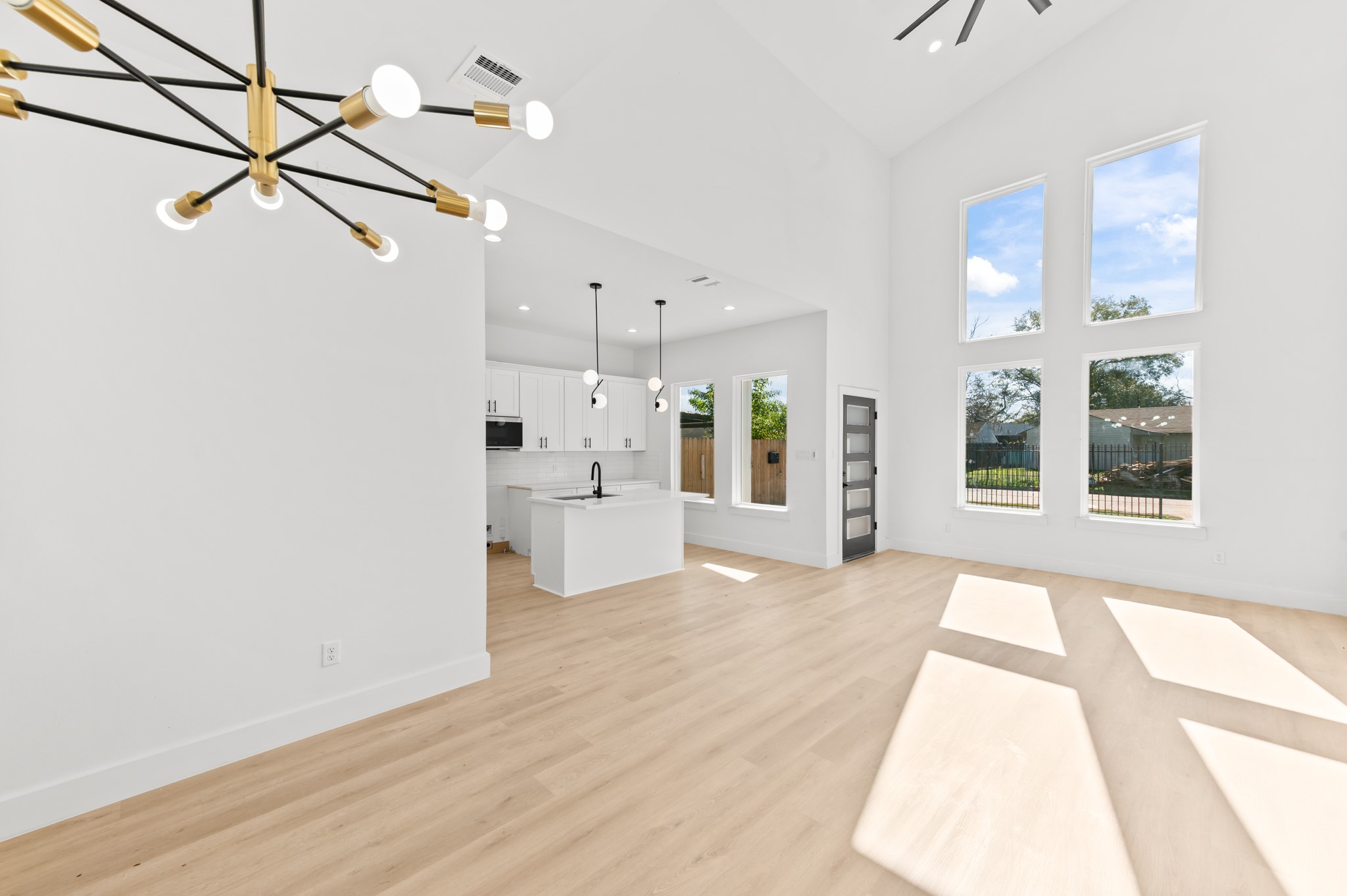 5903 Doolittle Boulevard Houston, TX 77033 - Photo 11 of 30 a view of a kitchen with a sink and windows