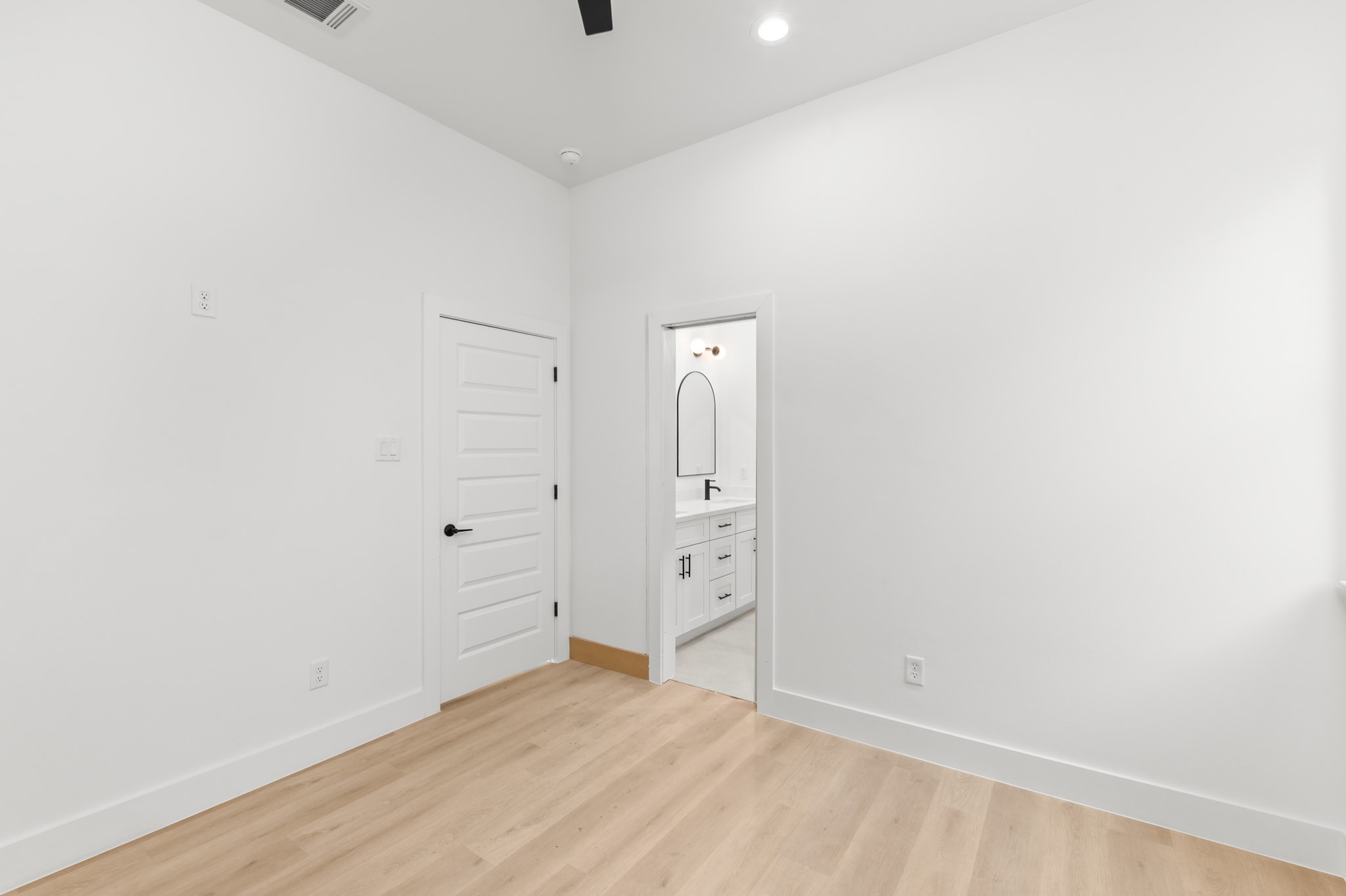 5903 Doolittle Boulevard Houston, TX 77033 - Photo 18 of 30 wooden floor in an empty room