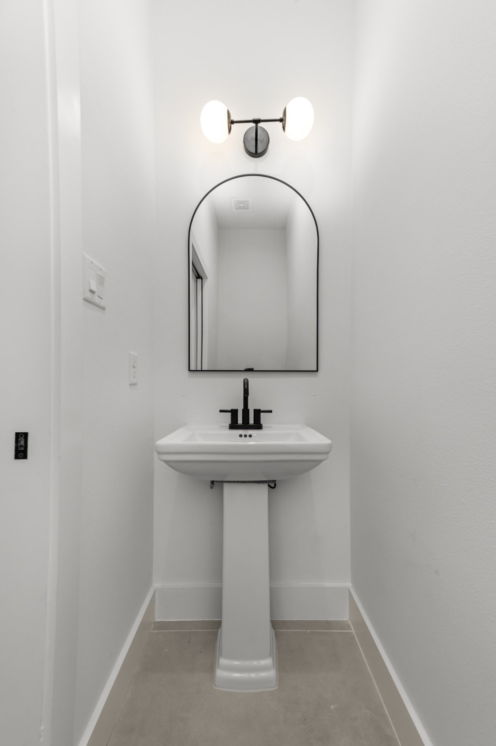 5903 Doolittle Boulevard Houston, TX 77033 - Photo 21 of 30 a bathroom with a sink and mirror