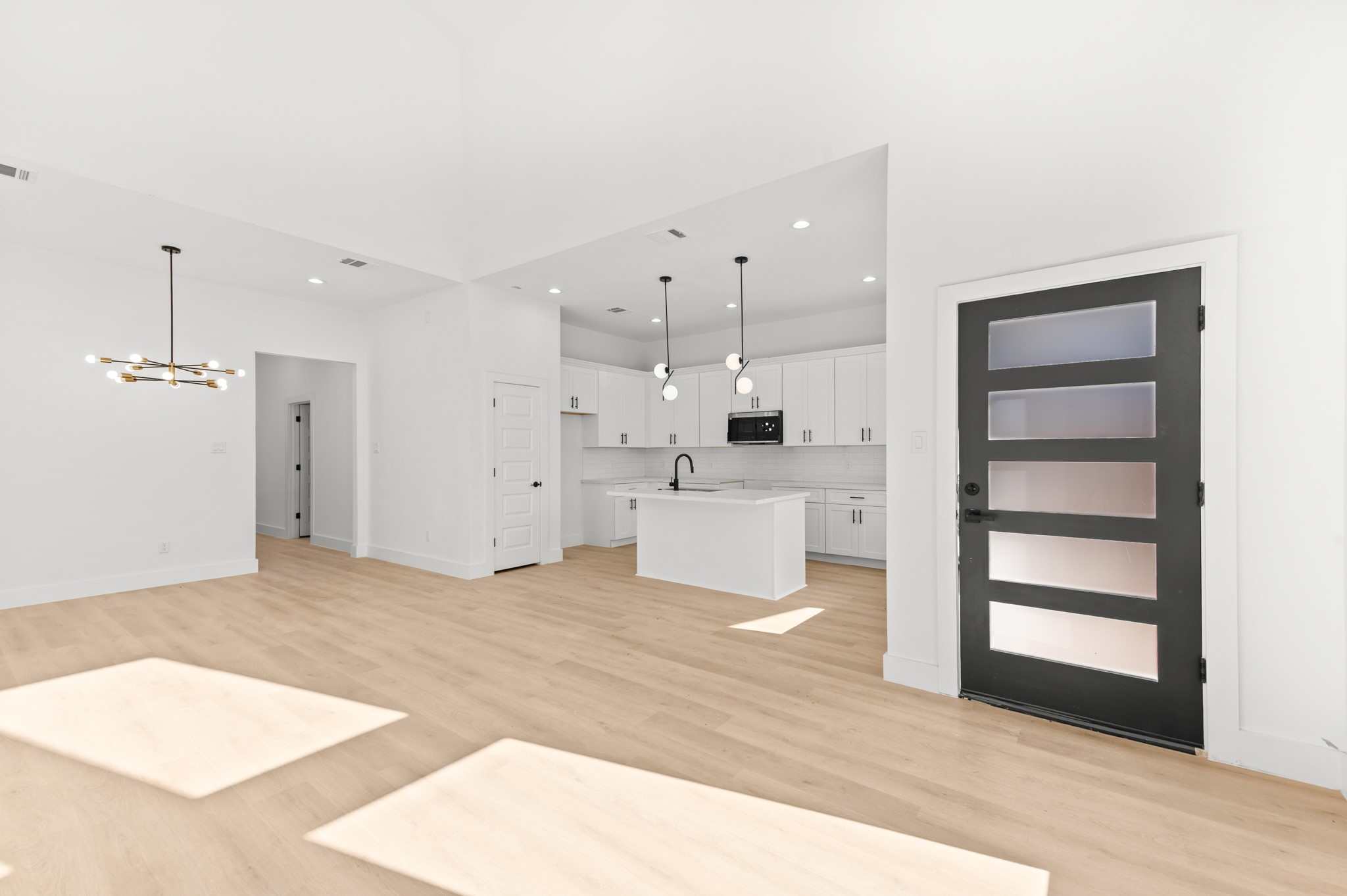 5903 Doolittle Boulevard Houston, TX 77033 - Photo 23 of 30 a view of a kitchen with wooden floor