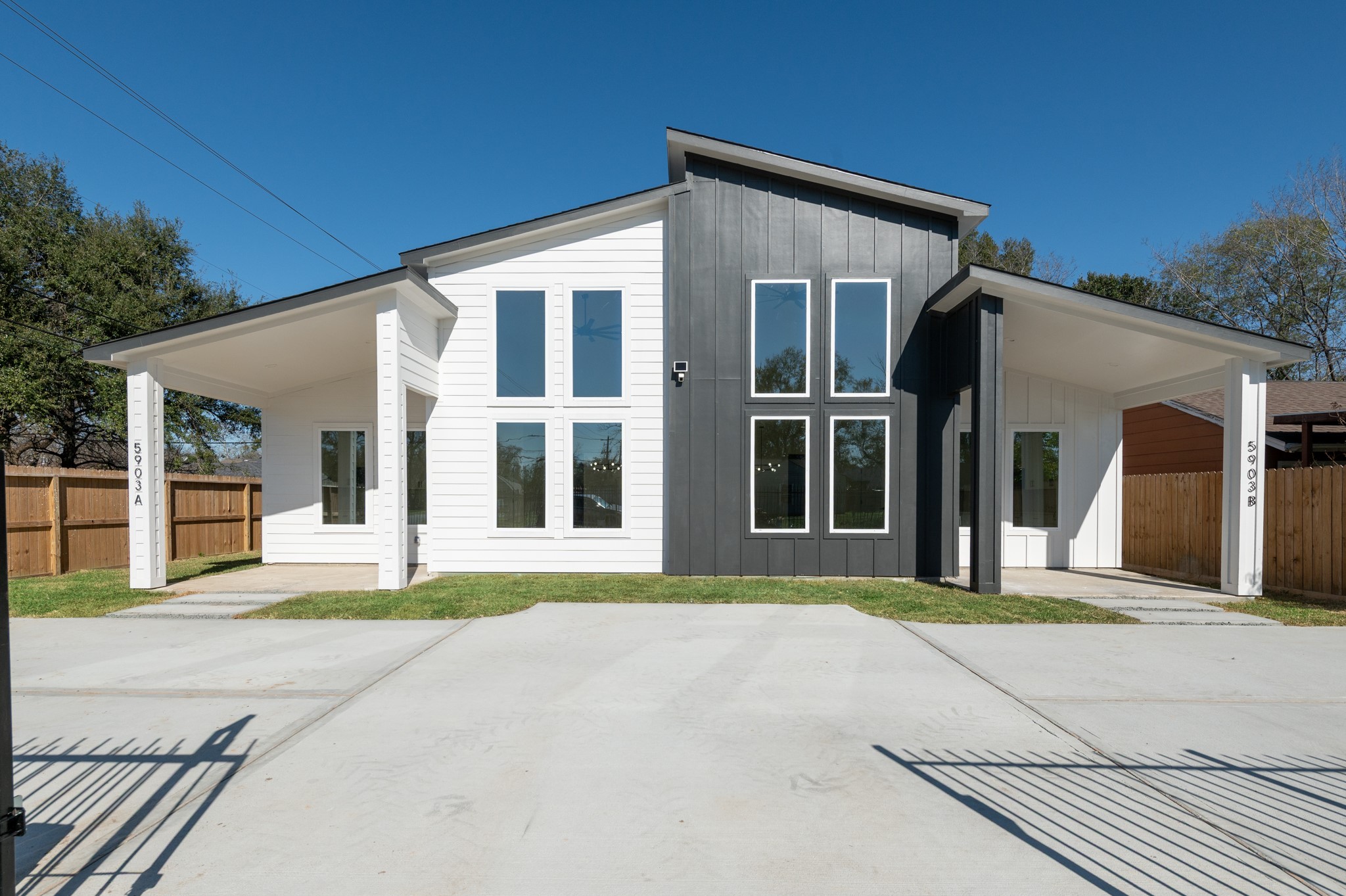 5903 Doolittle Boulevard Houston, TX 77033 - Photo 5 of 30 a front view of a house with a yard