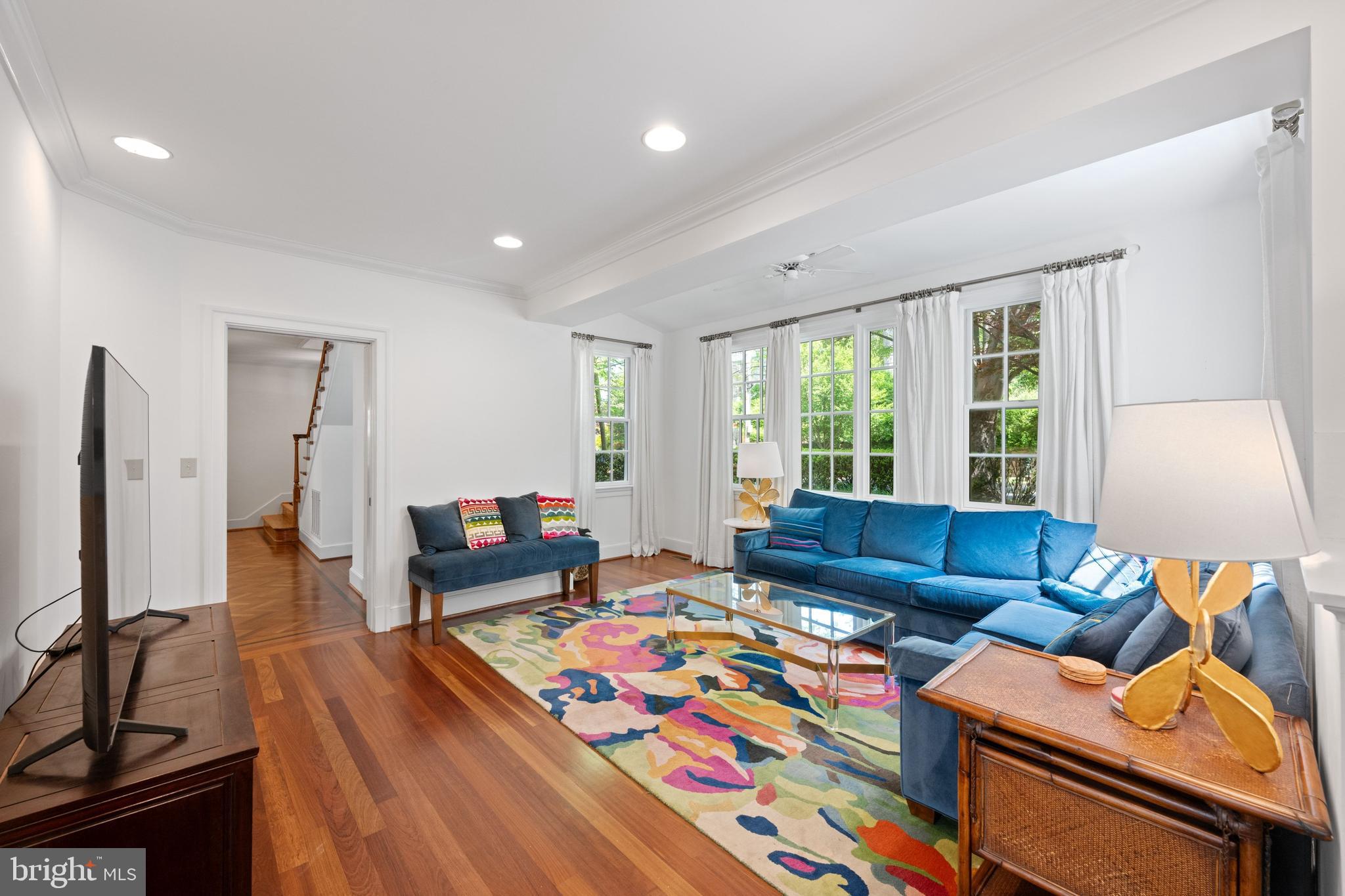 1702 Kalmia Road Northwest Washington, DC 20012 - Photo 11 of 55 a living room with furniture and a flat screen tv