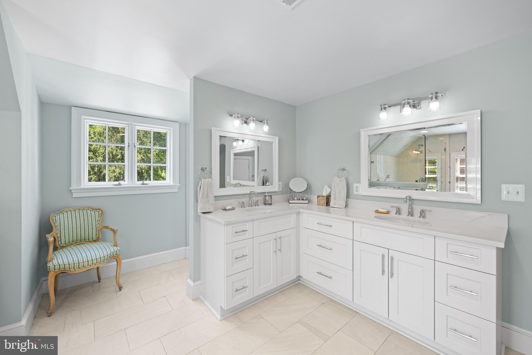 1702 Kalmia Road Northwest Washington, DC 20012 - Photo 22 of 55 a spacious bathroom with a granite countertop sink and a mirror