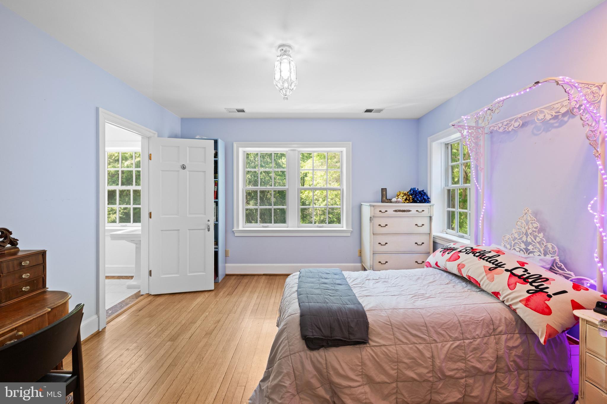 1702 Kalmia Road Northwest Washington, DC 20012 - Photo 23 of 55 a bedroom with a bed and a window