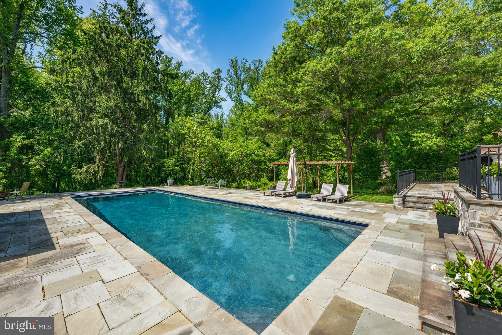 1702 Kalmia Road Northwest Washington, DC 20012 - Photo 46 of 55 a view of a swimming pool with a patio