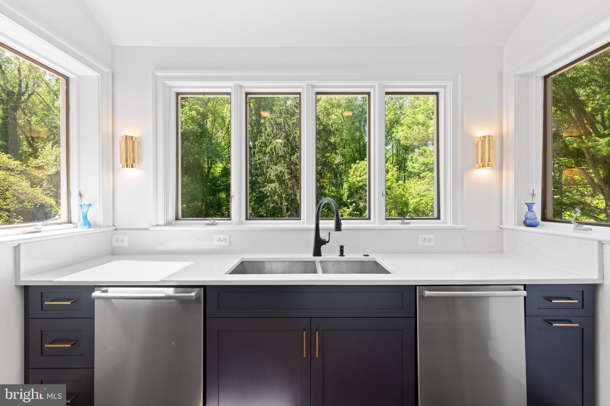 1702 Kalmia Road Northwest Washington, DC 20012 - Photo 5 of 55 a kitchen with a sink and a window