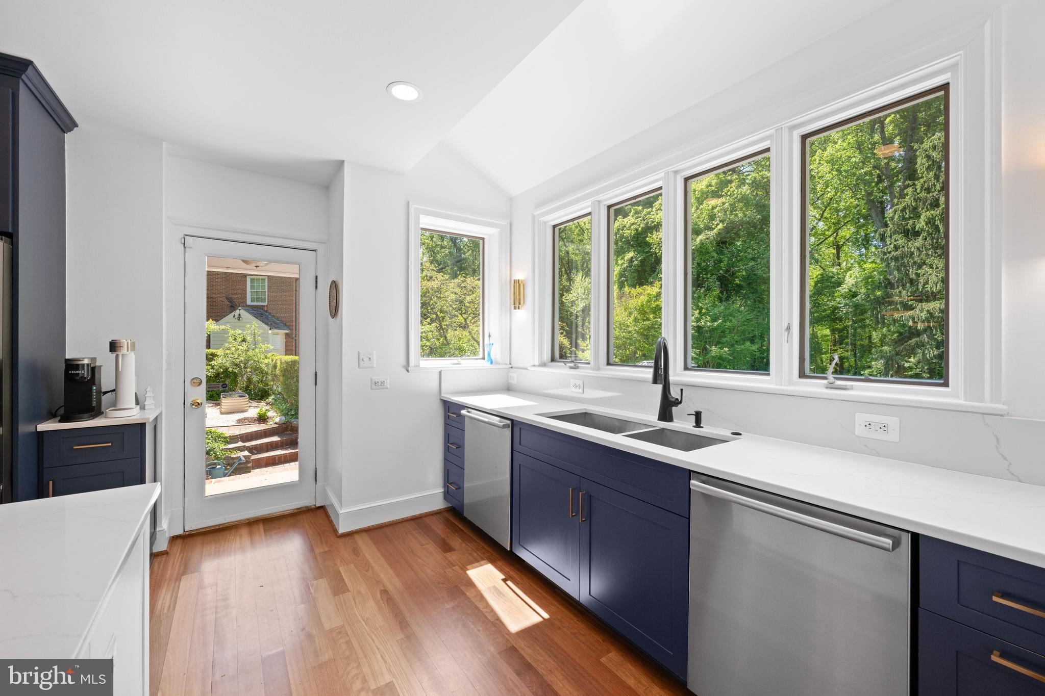 1702 Kalmia Road Northwest Washington, DC 20012 - Photo 6 of 55 a kitchen with a sink and large window