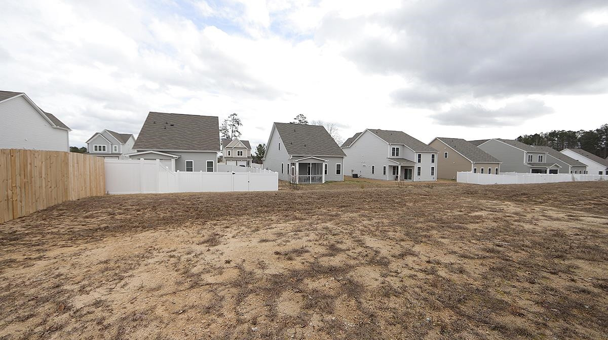 3705 Putman Road Raleigh, NC 27610 - Photo 19 of 19 This is the .16 acreage. You can create a firepit or a brick fireplace in the backyard to extend the outside living space. Backyard