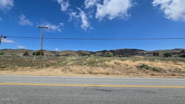 a view of ocean and a mountain