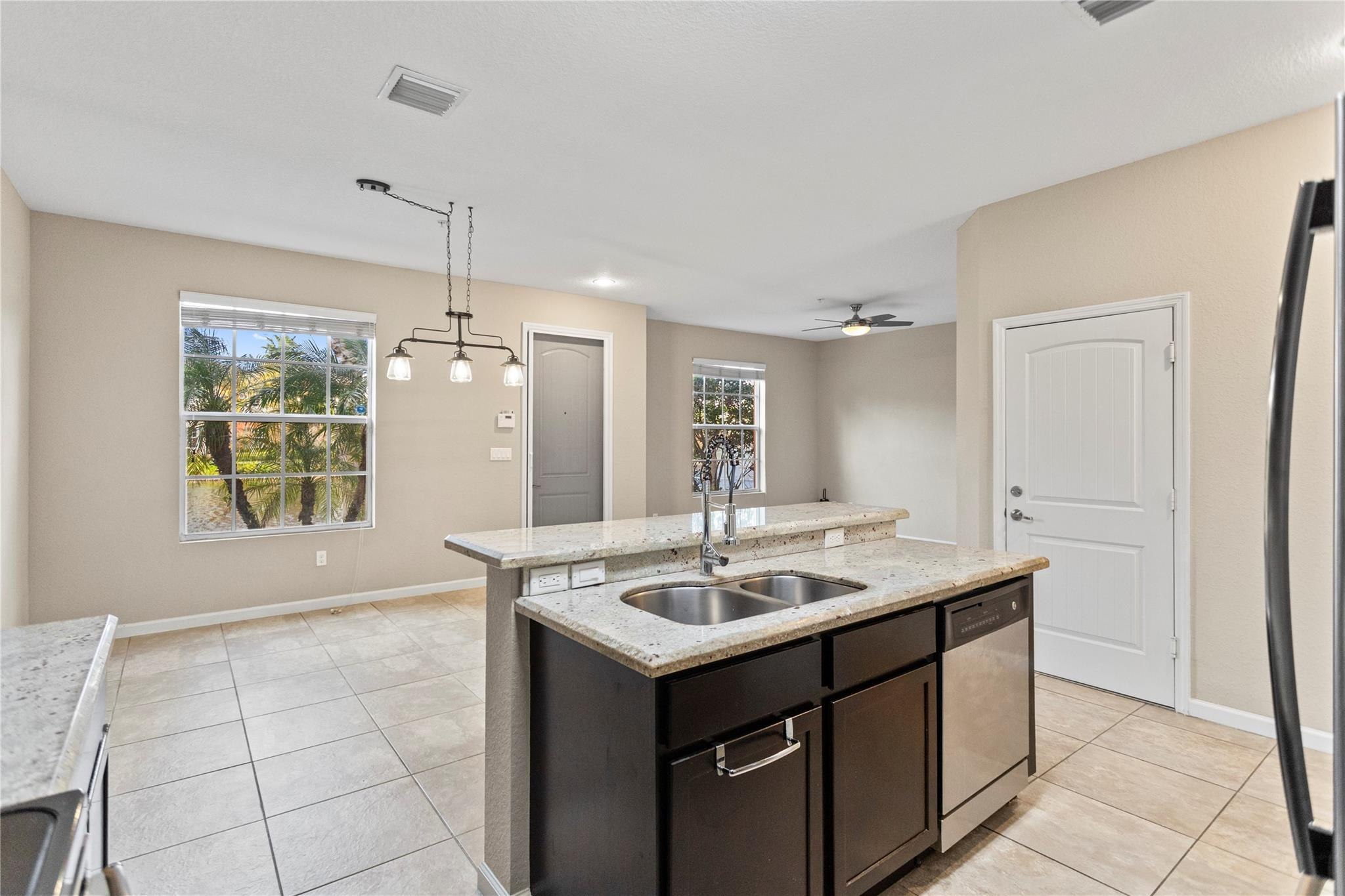 259 Southwest 7th Street, Unit 259 Pompano Beach, FL 33060 - Photo 11 of 87 a bathroom with a sink vanity and a mirror
