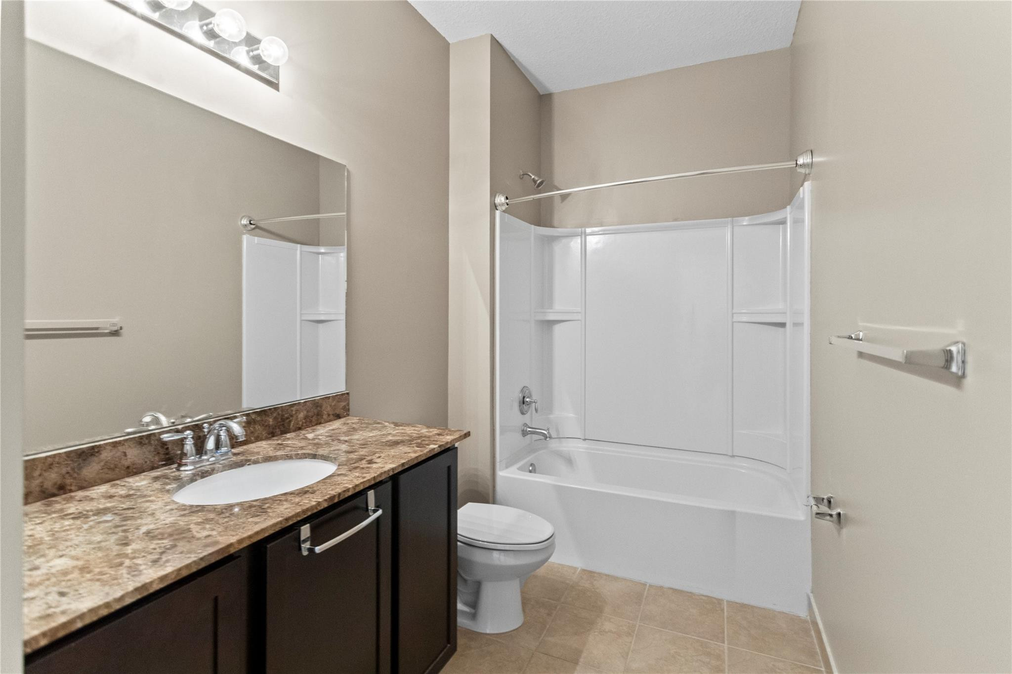 259 Southwest 7th Street, Unit 259 Pompano Beach, FL 33060 - Photo 47 of 87 a bathroom with a granite countertop sink toilet and shower