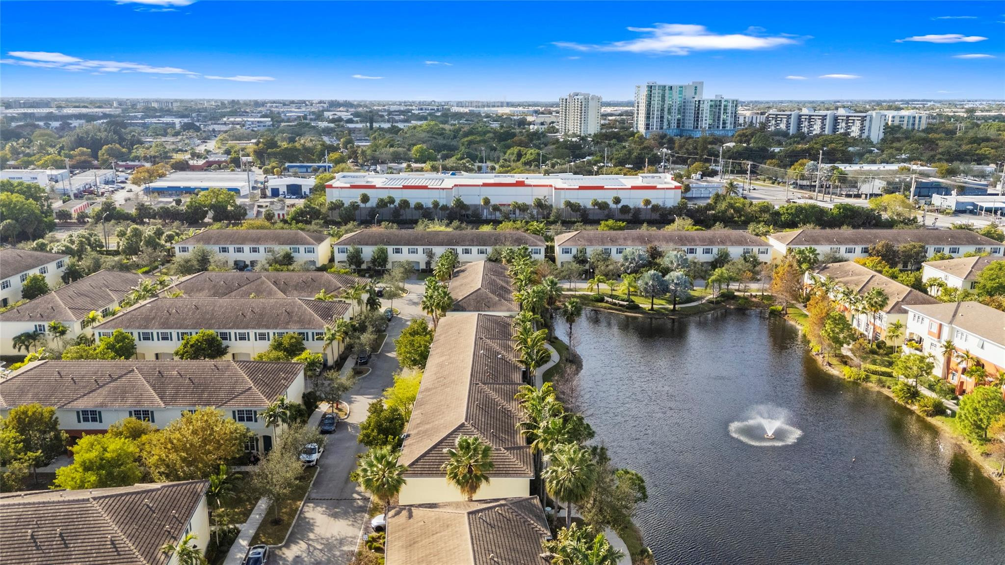 259 Southwest 7th Street, Unit 259 Pompano Beach, FL 33060 - Photo 65 of 87 an aerial view of residential houses with outdoor space