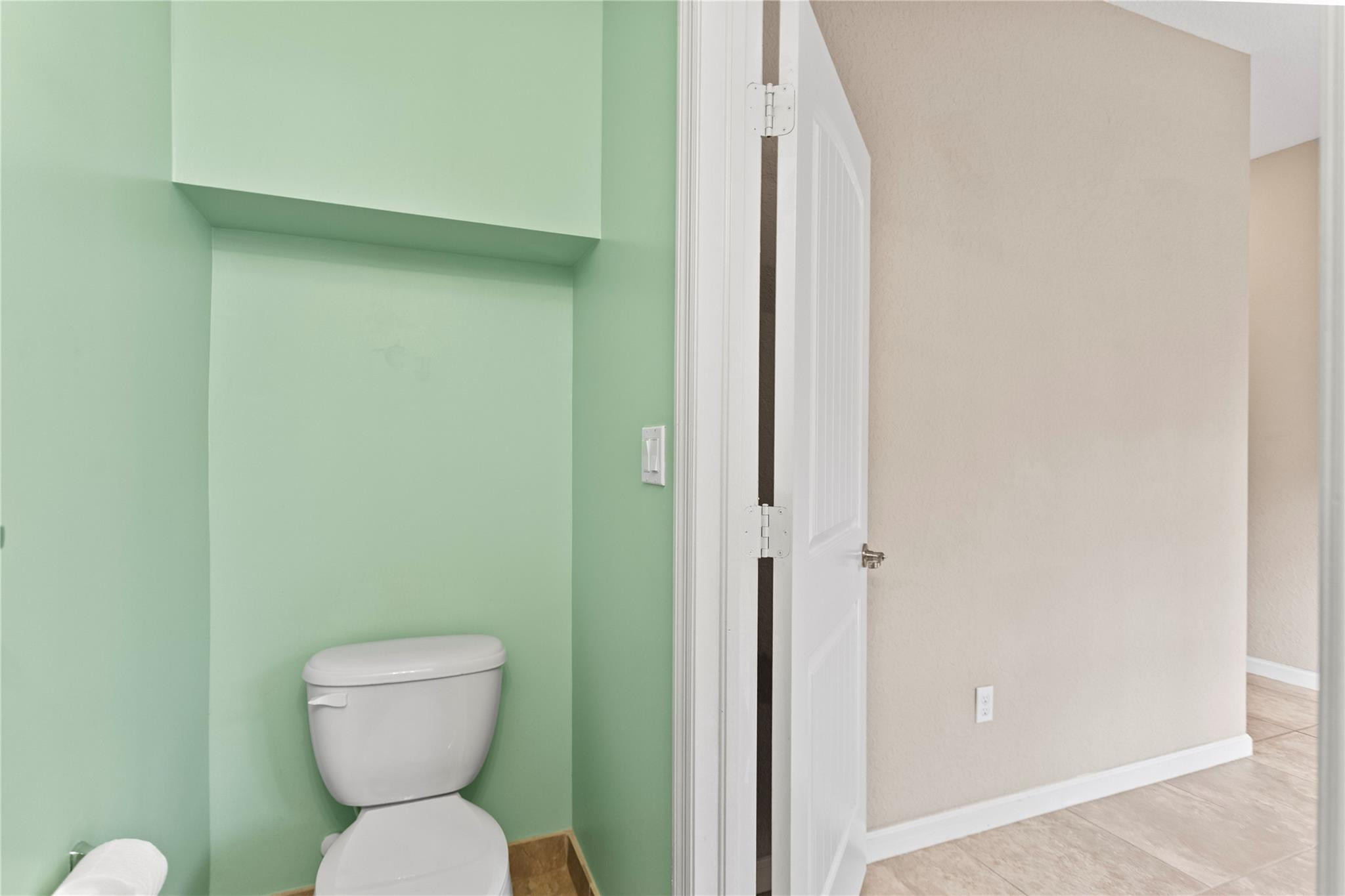 259 Southwest 7th Street, Unit 259 Pompano Beach, FL 33060 - Photo 10 of 87 a bathroom with a toilet and a shower