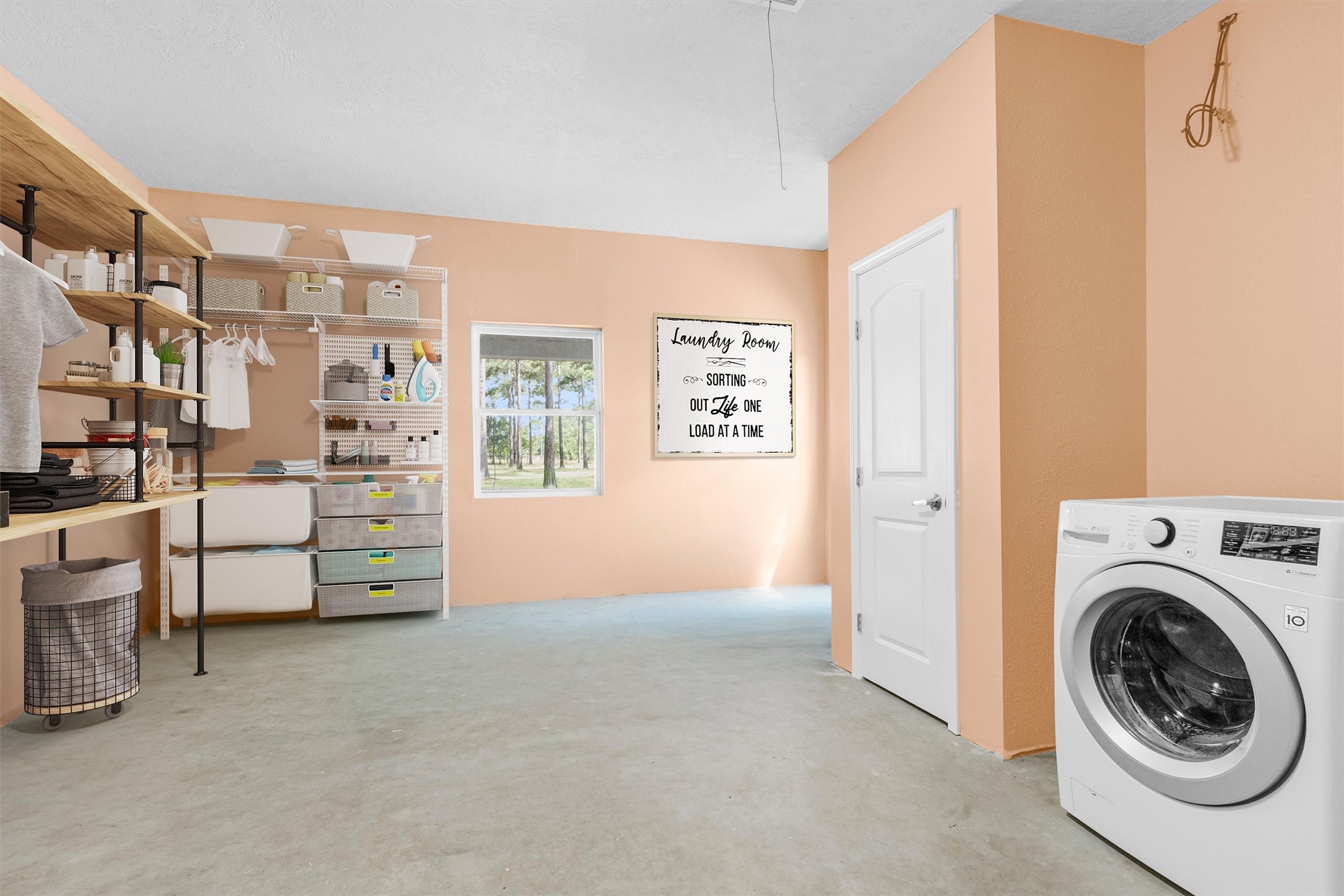 9321 North Walker Road Cleveland, TX 77328 - Photo 35 of 49 Huge Laundry room with AC; Also can be used as a flex room to fit your needs...study, storage or additional living space.