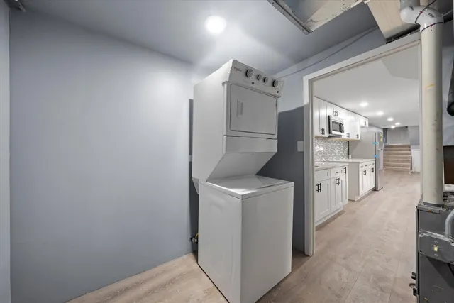 a view of a storage & utility room with washer and dryer