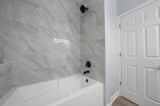 a bathroom with a bathtub