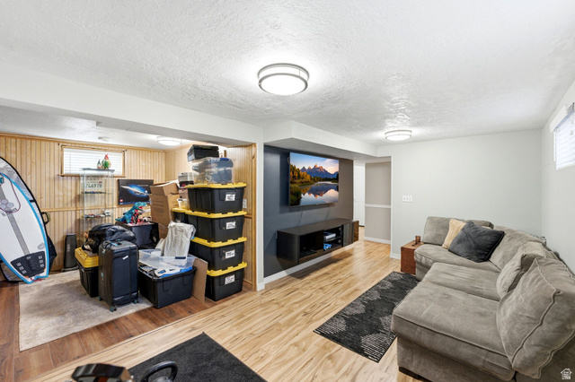 935 900 North Bountiful, UT 84010 - Photo 28 of 46 Living area with light wood-style flooring and a textured ceiling