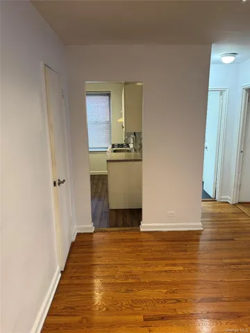 a kitchen with granite countertop a stove and a sink