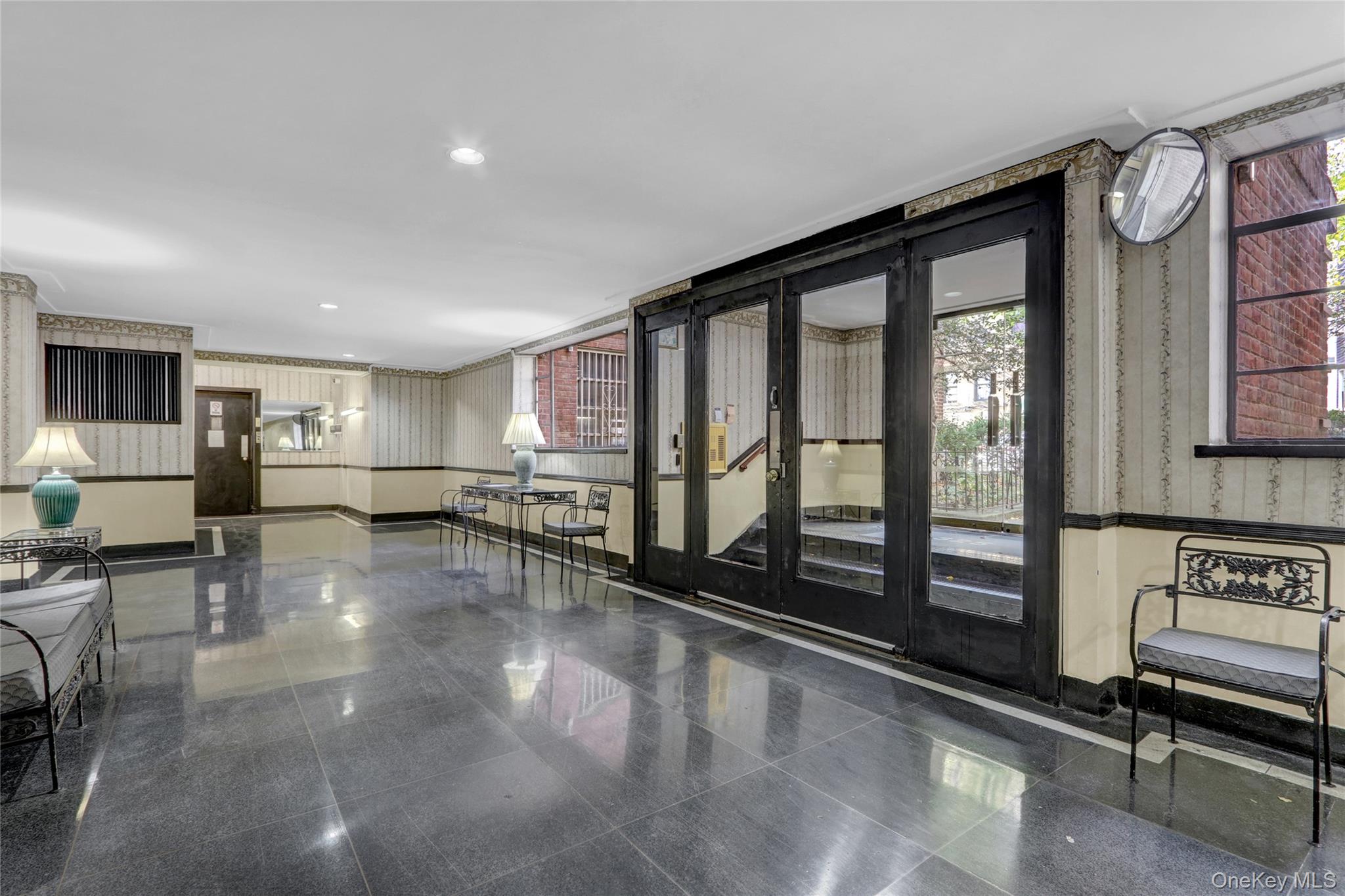 325 East 201st Street, Unit 3J Bronx, NY 10458 - Photo 2 of 33 a lobby with furniture and window