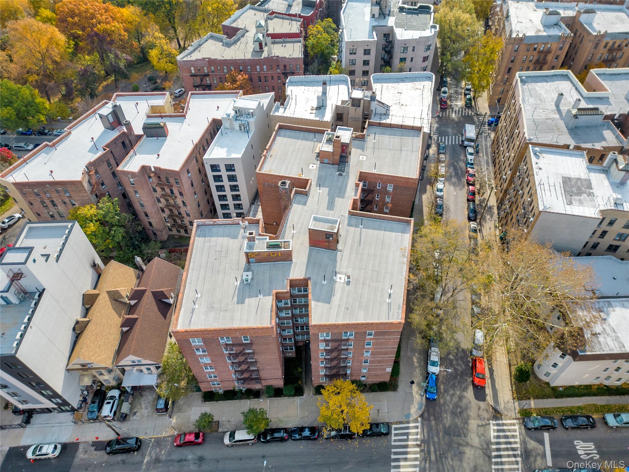 325 East 201st Street, Unit 3J Bronx, NY 10458 - Photo 6 of 33 an aerial view of residential houses with outdoor space