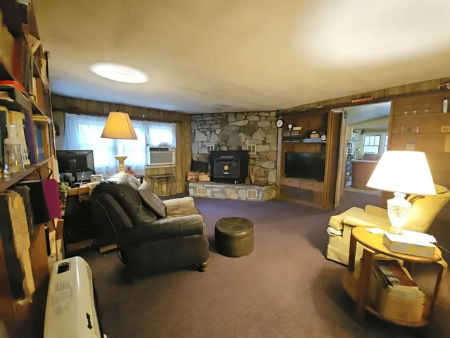 a kitchen with a refrigerator a stove and a cabinets