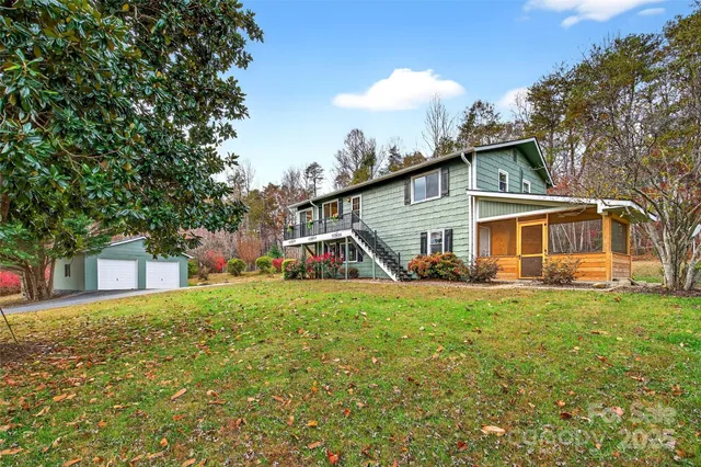 a view of a house with a back yard