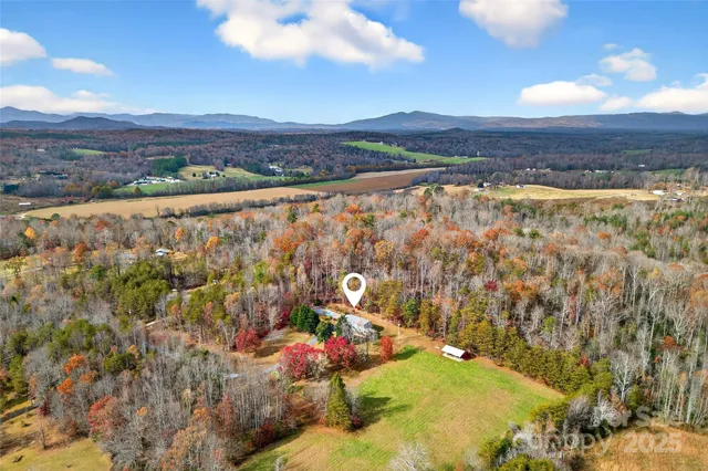 a view of a city with mountains in the background