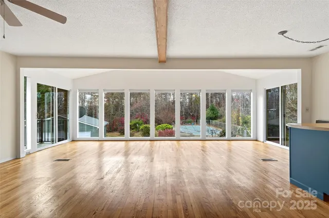 a view of an house with porch and wooden floor