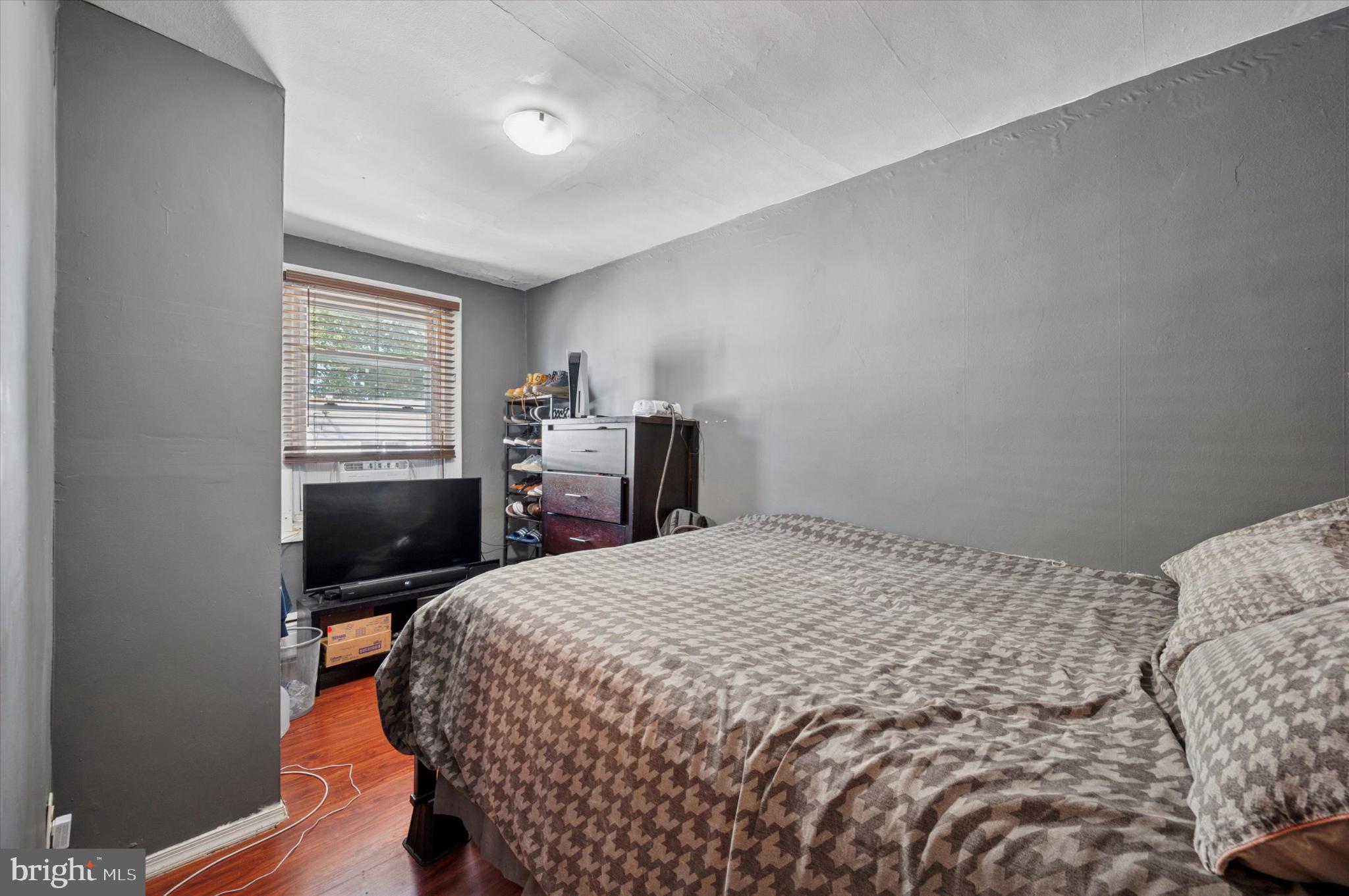 1052 Edgemore Road Philadelphia, PA 19151 - Photo 17 of 24 Cozy bedroom with modern gray accents.
