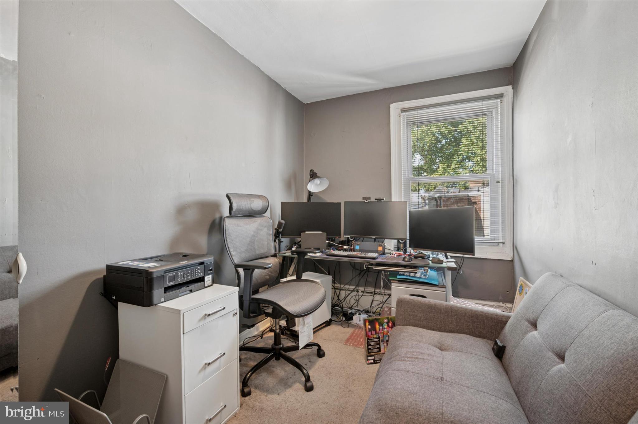 1052 Edgemore Road Philadelphia, PA 19151 - Photo 18 of 24 Cozy workspace with natural light.