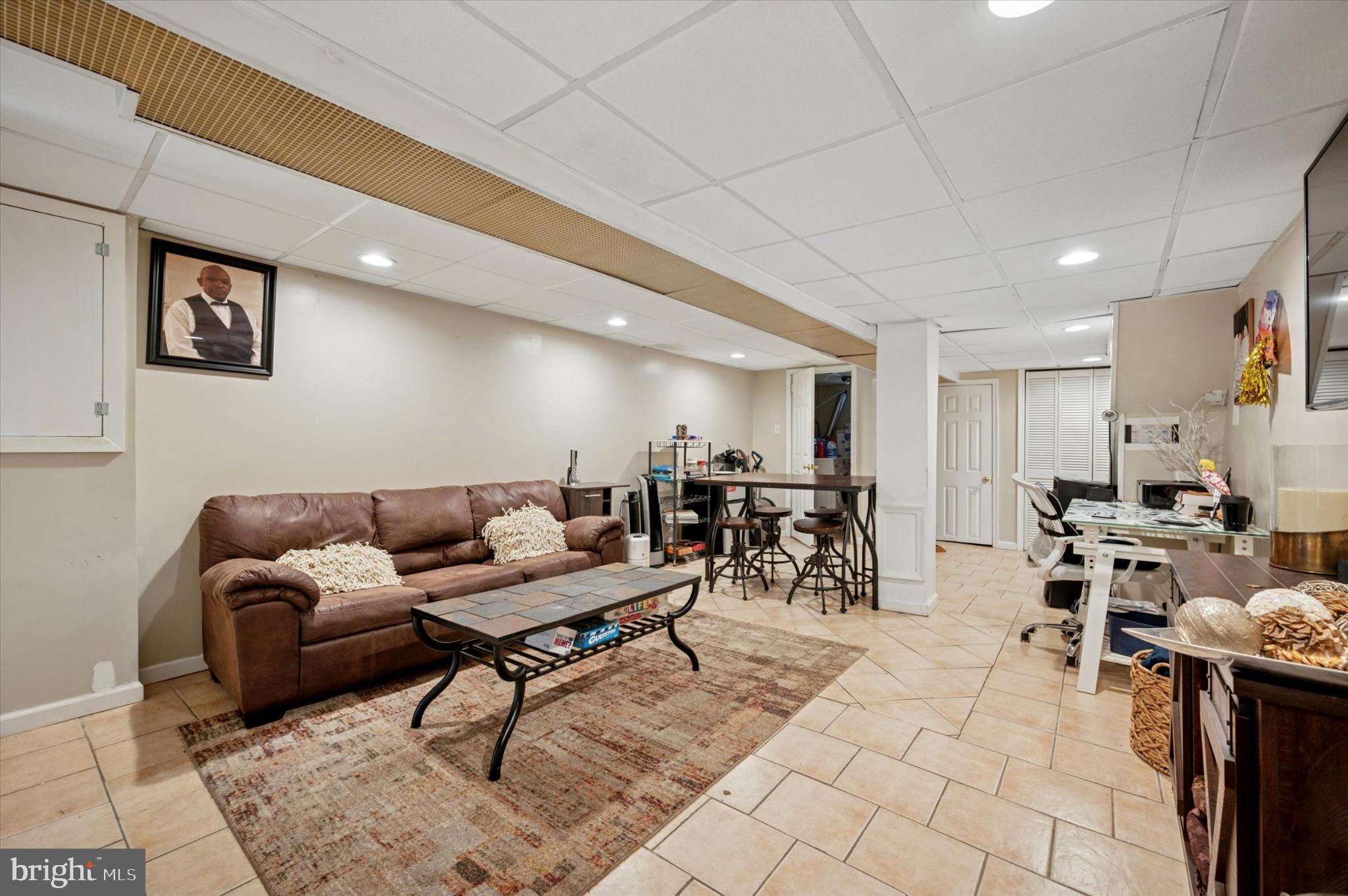 1052 Edgemore Road Philadelphia, PA 19151 - Photo 22 of 24 Spacious basement retreat with modern charm.