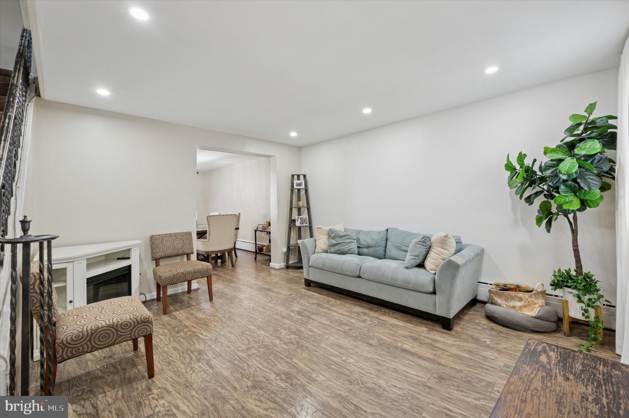 1052 Edgemore Road Philadelphia, PA 19151 - Photo 3 of 24 Spacious living area with modern charm.