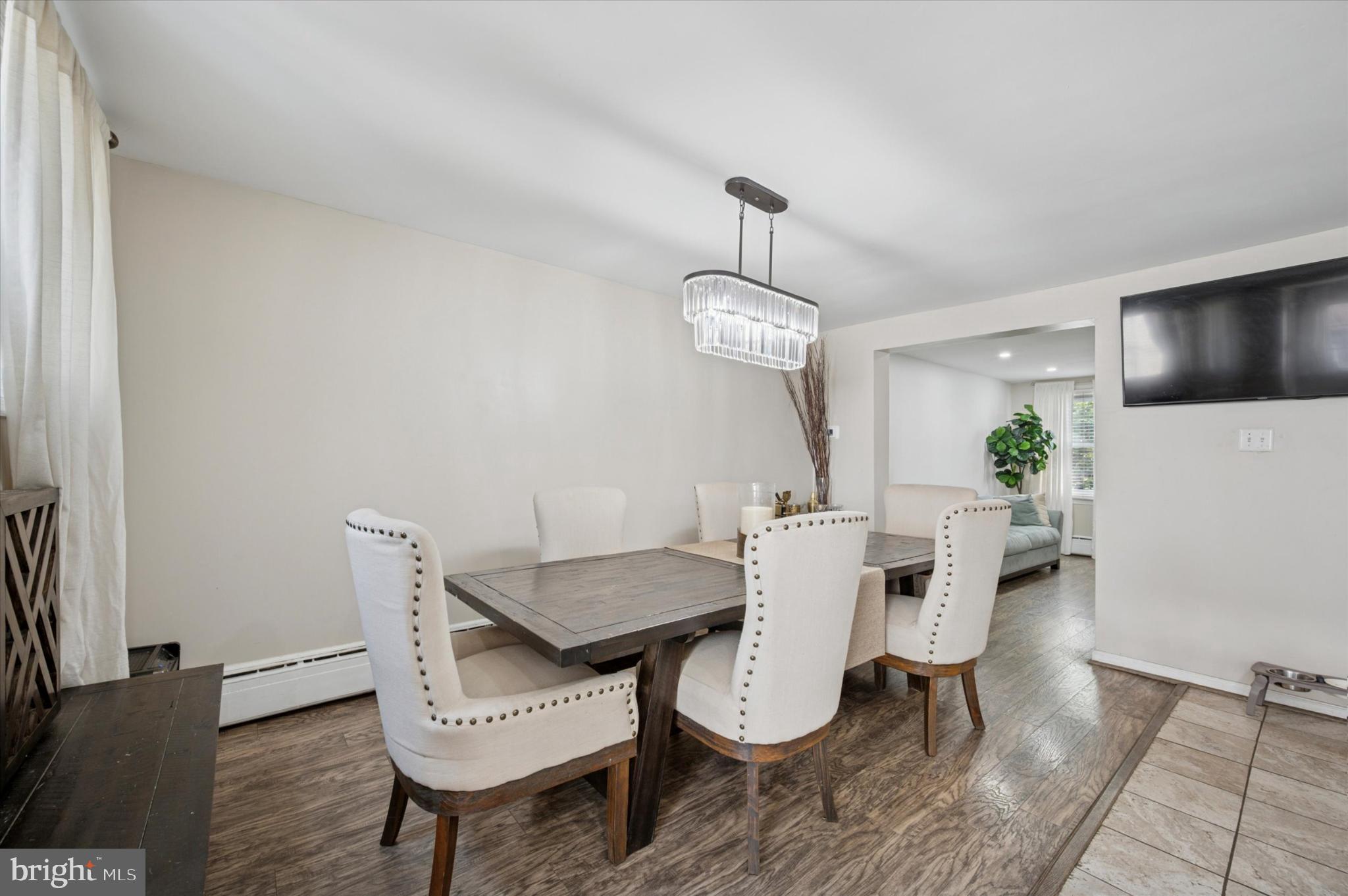 1052 Edgemore Road Philadelphia, PA 19151 - Photo 7 of 24 Elegant dining space with modern charm.