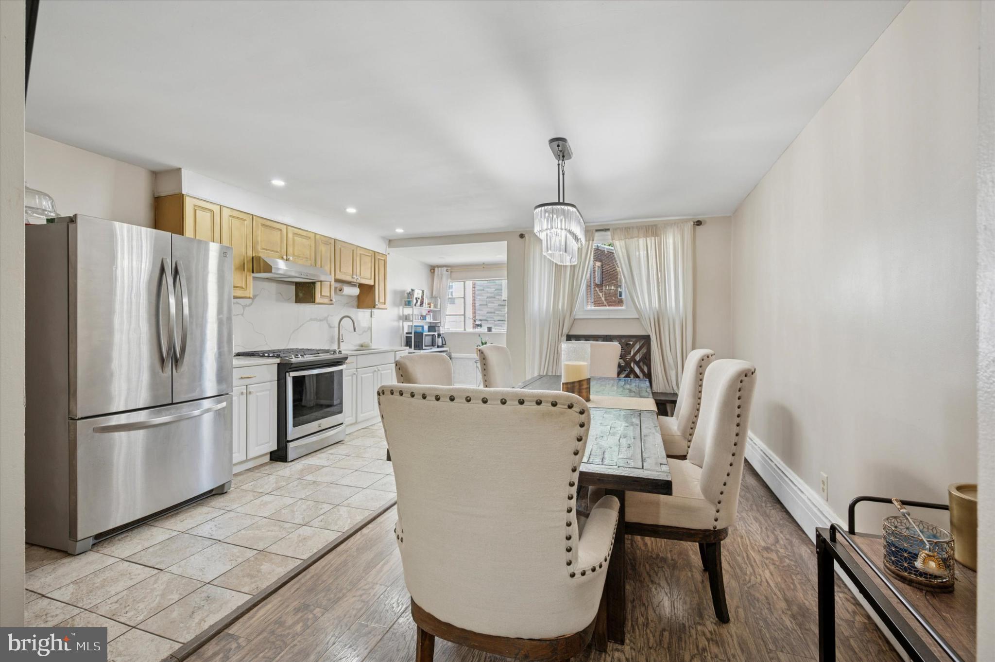 1052 Edgemore Road Philadelphia, PA 19151 - Photo 8 of 24 Modern kitchen with elegant dining area.