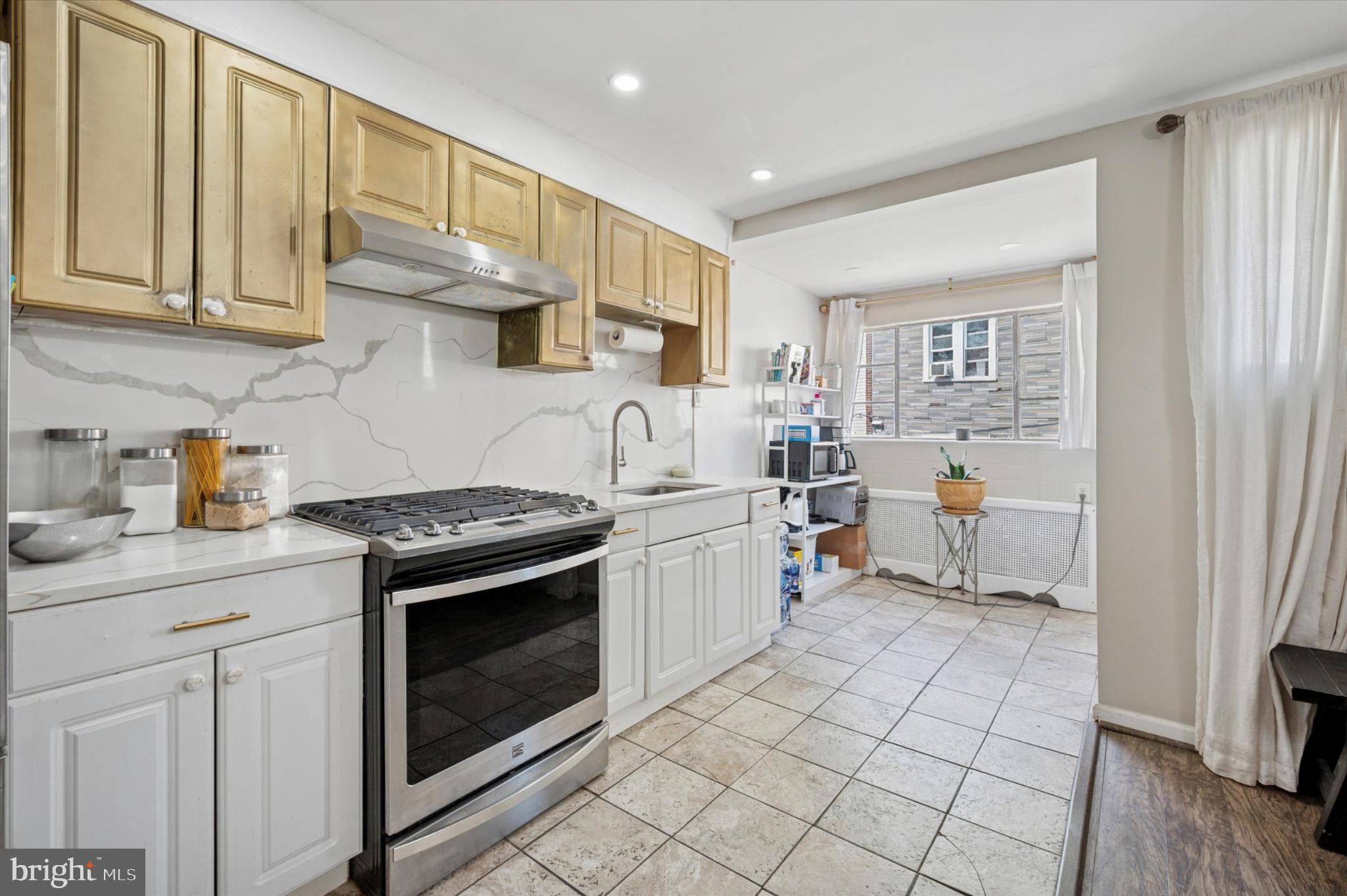 1052 Edgemore Road Philadelphia, PA 19151 - Photo 9 of 24 Modern kitchen with elegant finishes.